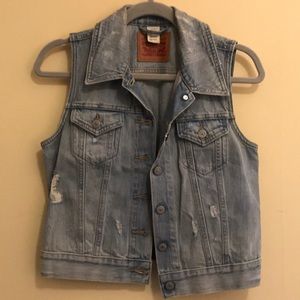 Levi’s light wash distressed denim vest